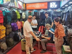 Group of exhibitors engaging with visitors at the trade show